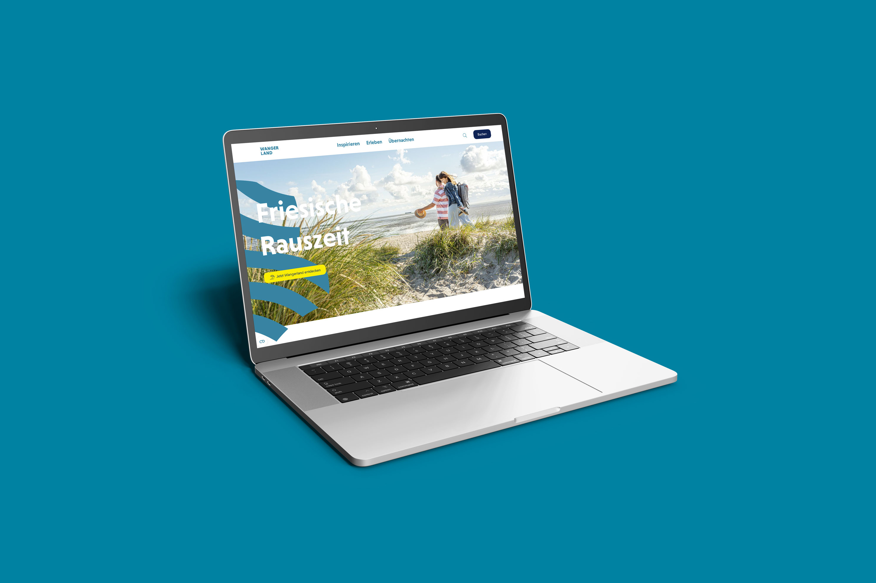 Laptop mit Wangerland Website auf blauen Hintergrund